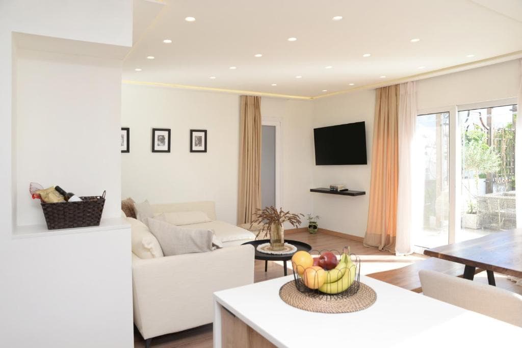 Modern living room with sea view and dining area